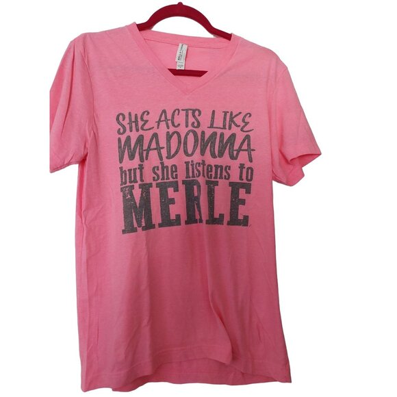 She Acts Like Madonna But Listens To Merle Womens Bella+Canvas Pink V-Neck T-Shi - Picture 1 of 3